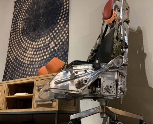 Office chair made of a polished Lockheed C2 ejection seat for sale.