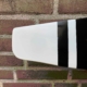 Detail of the tip of a two-bladed McCauley propeller that is available as a decorative wall hanger.