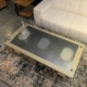 Polished window section of an Airbus A320 passenger aircaft turned into a coffee table for sale.