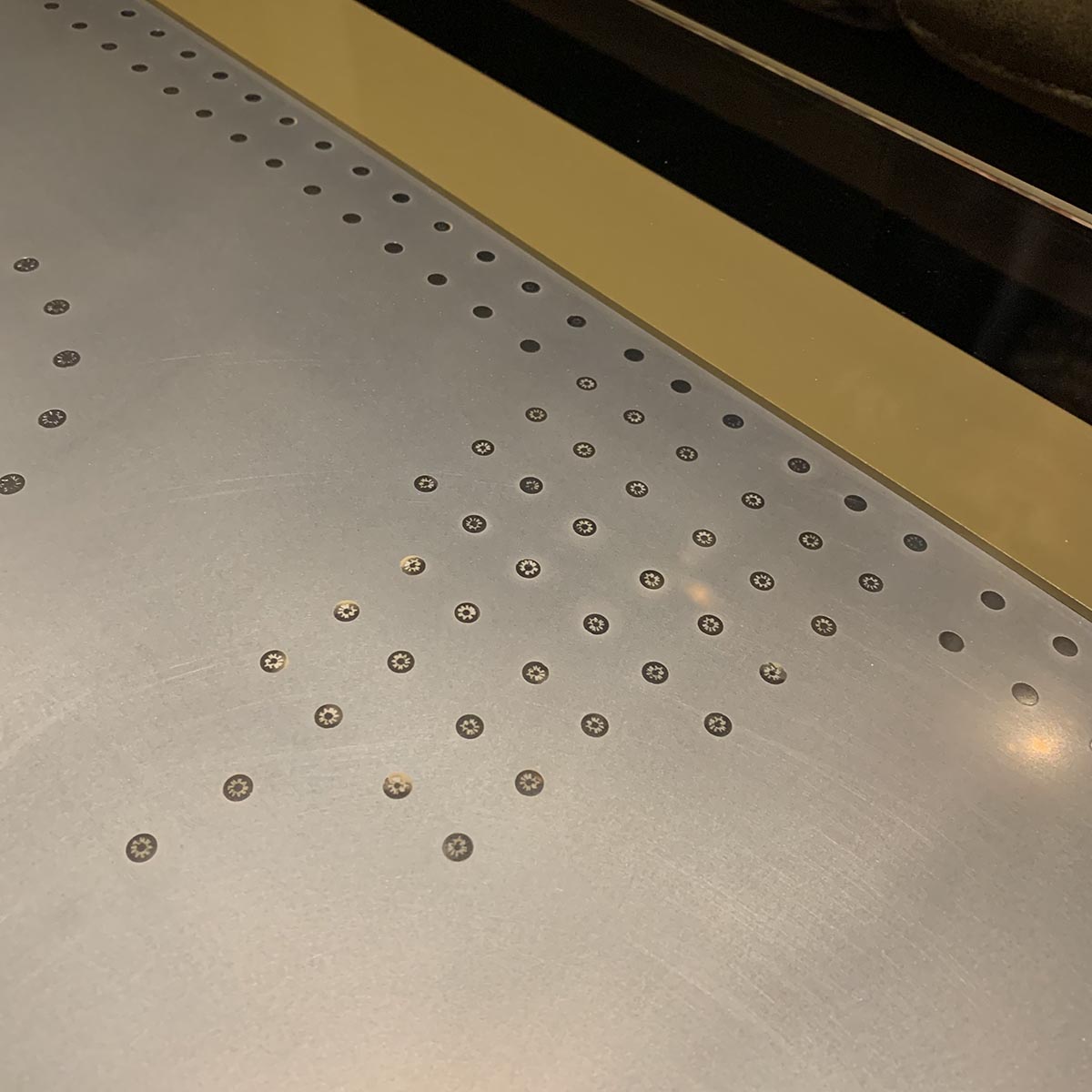 Photo showing some of the large amount of titanium rivets on an Airbus A320 window section.