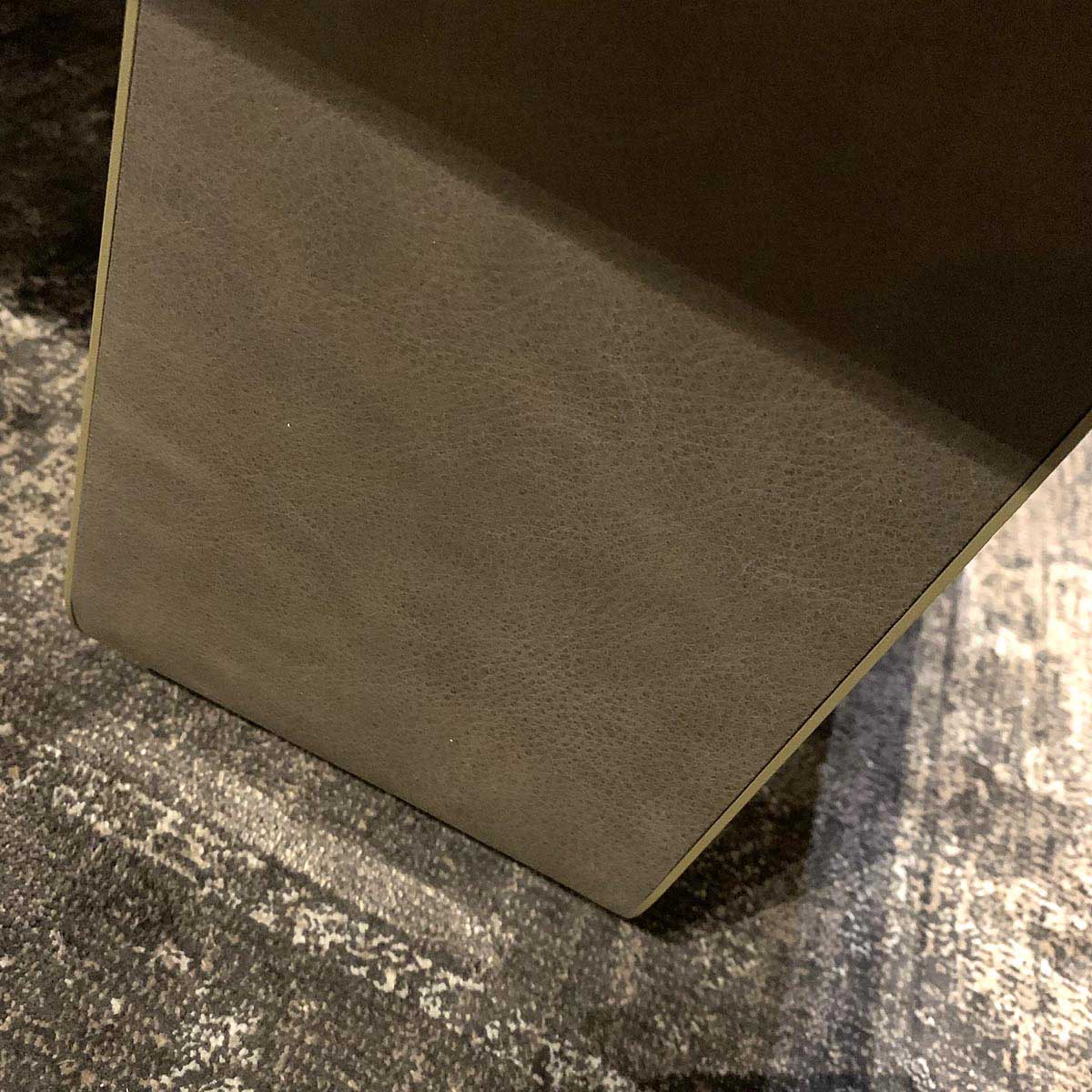 Photo of the high quality leather used to cover the supportings legs of a coffee table made from an Airbus A320 window section.