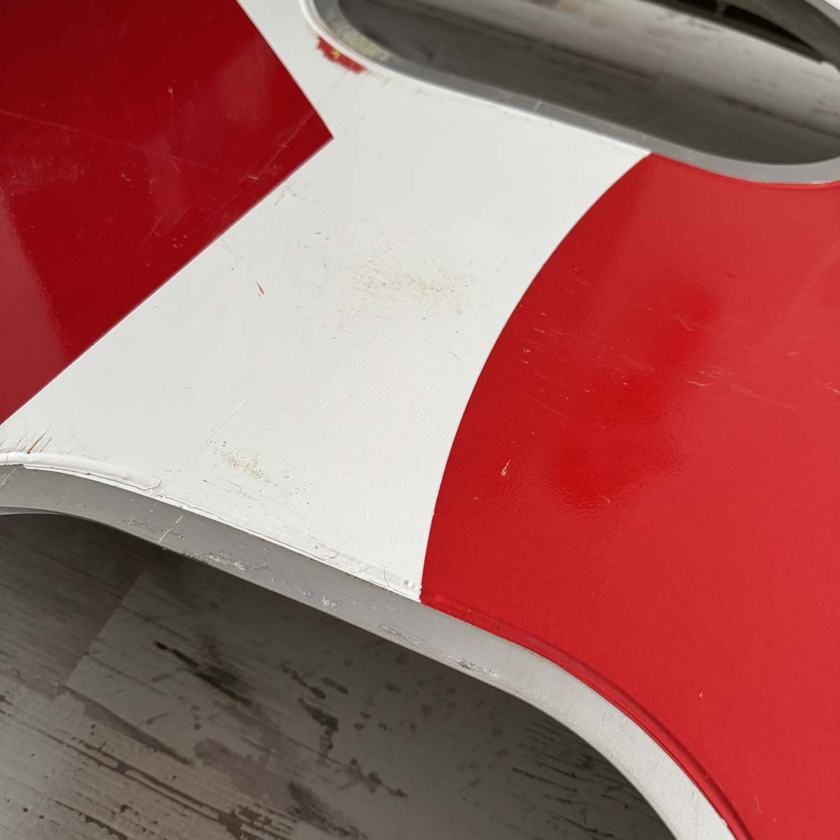 Photo of a detail of Brussels Airlines Airbus OO-SNA double window panel with Red Devil colours.